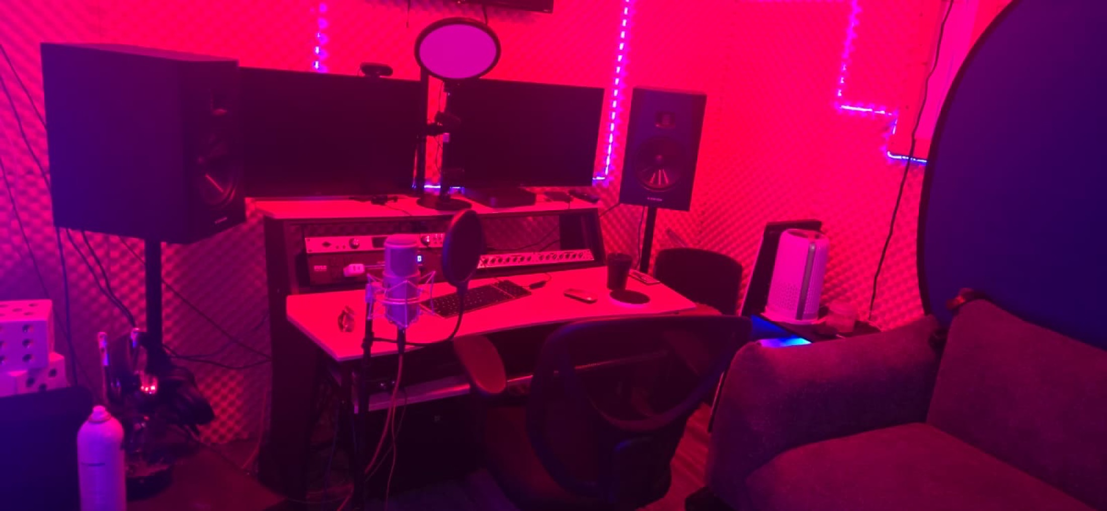 Red-lit A Room control desk inside Peace King Studios