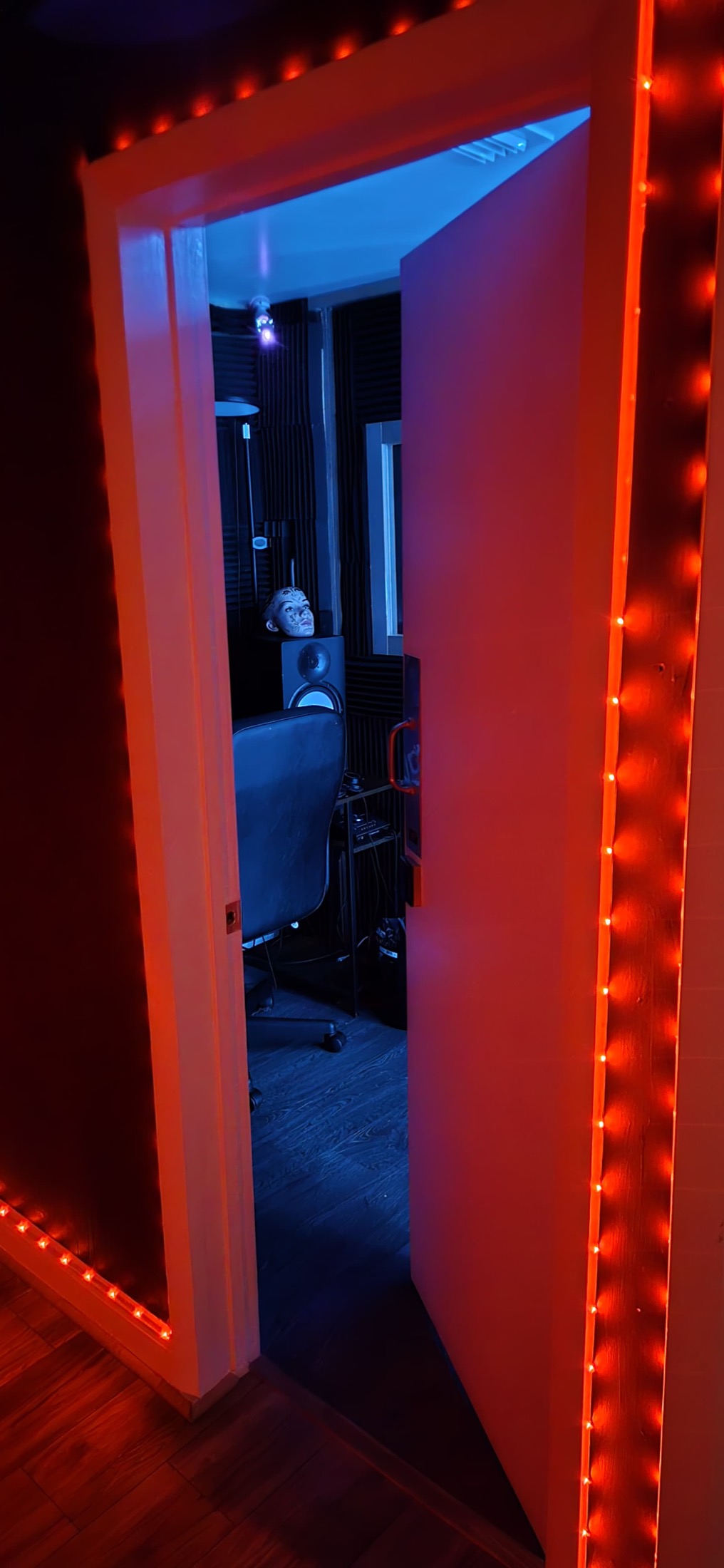 Peace King Studios B Room doorway with red and blue lighting